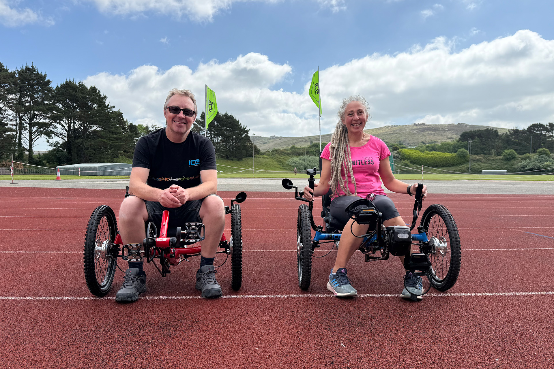two happy trike riders